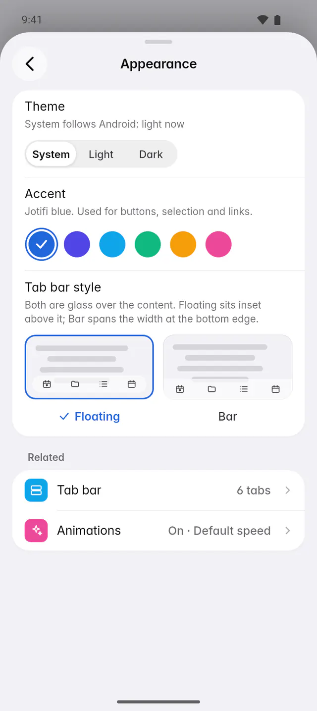 Appearance settings with the theme set to System and the six accent colours (an Android phone)