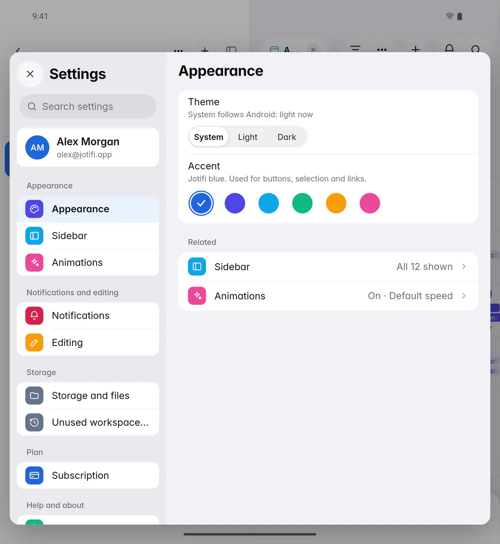 Appearance settings with the theme set to System and the six accent colours (an Android foldable)