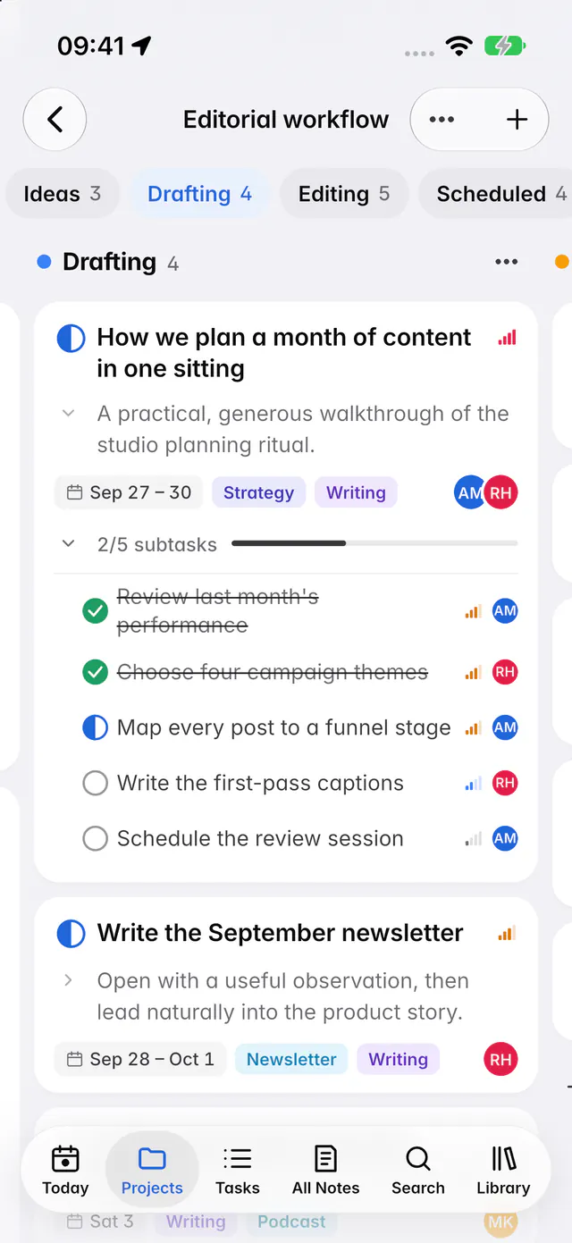 A board with Ideas, Drafting and Editing columns of task cards (an iPhone)