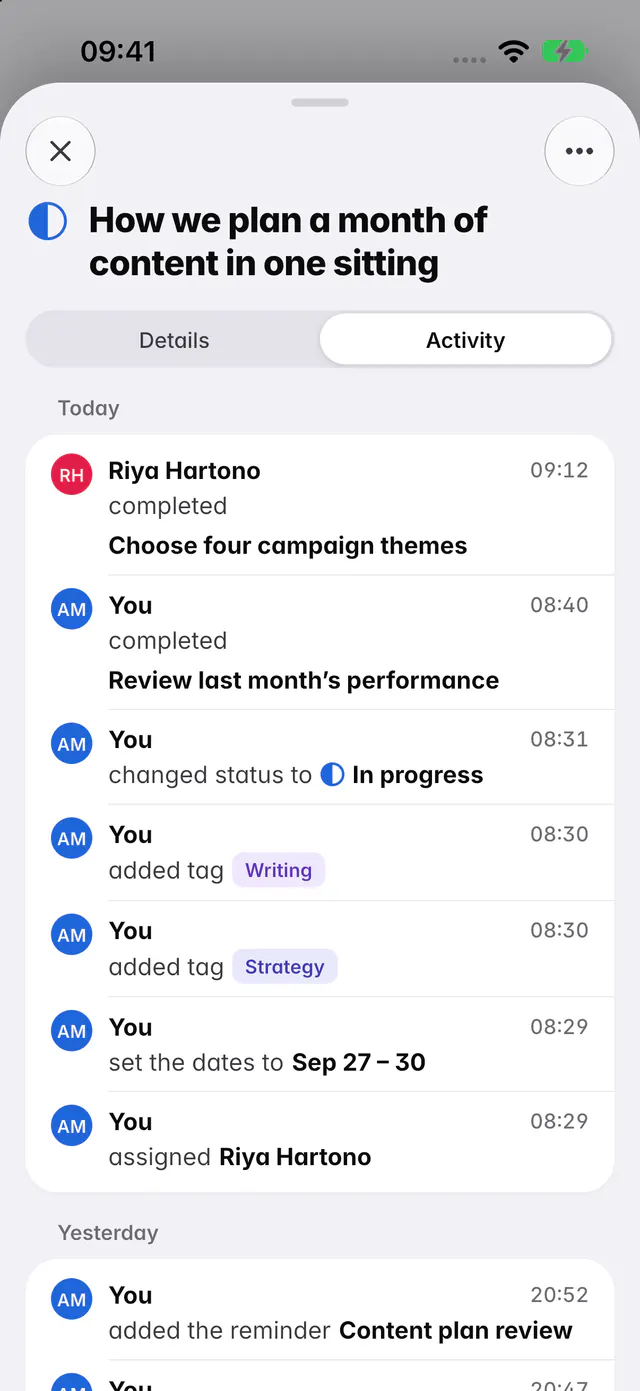 A task's Activity tab listing who completed, changed, tagged and assigned it, grouped by day (an iPhone)
