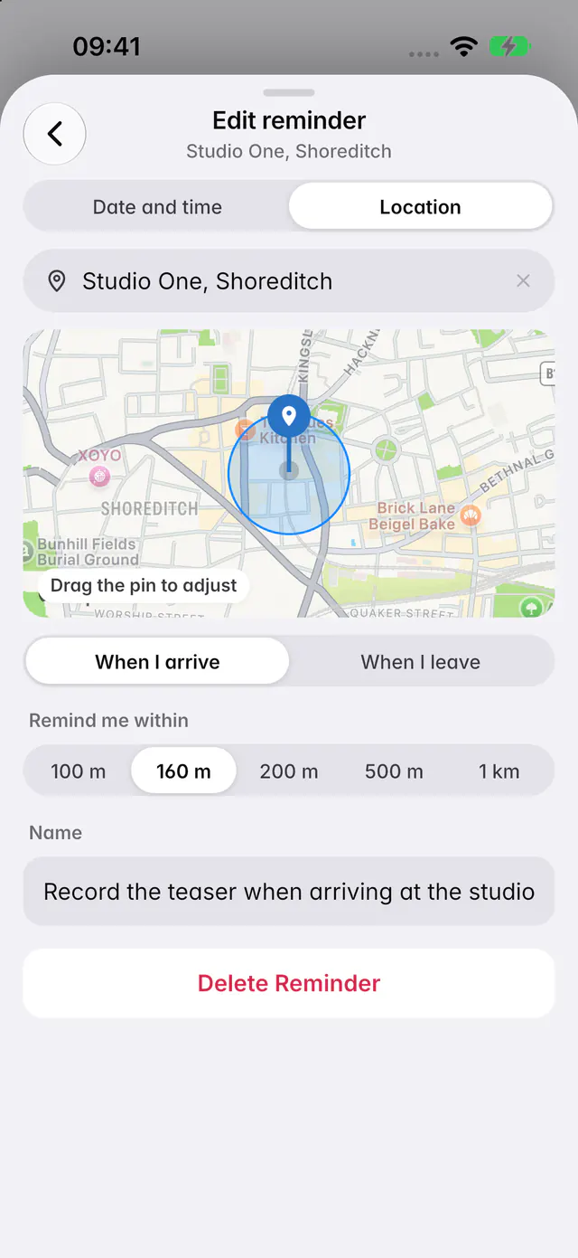A place reminder with the address, a map pin, When I arrive or When I leave and the distance (an iPhone)